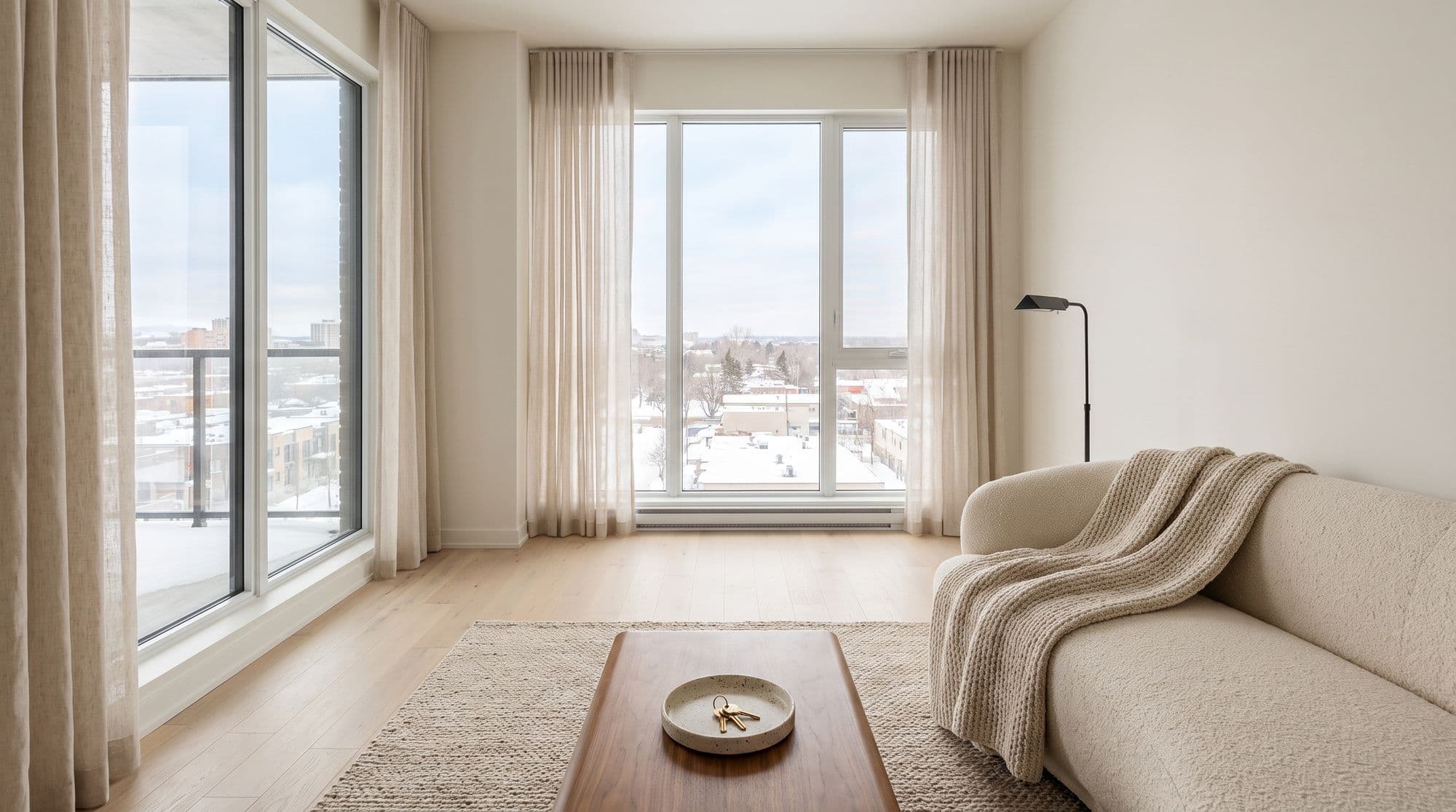 A bright, empty condo living room